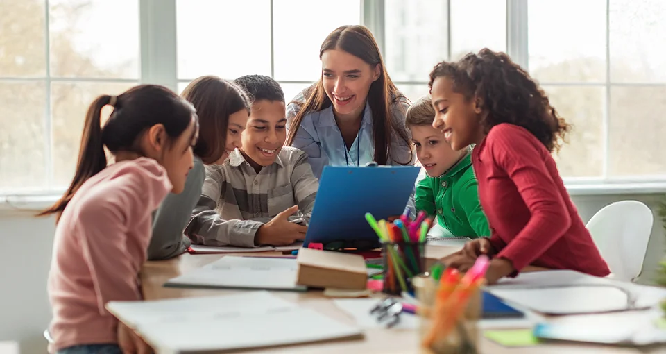 Children learning in a classroom Children learning in a classroom