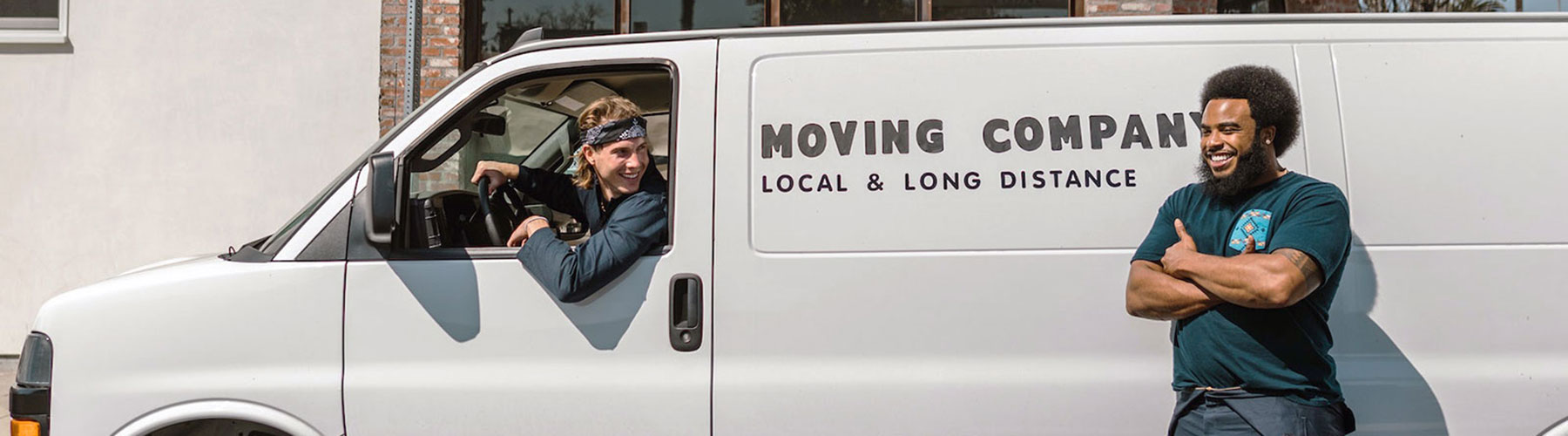 Happy movers by moving van