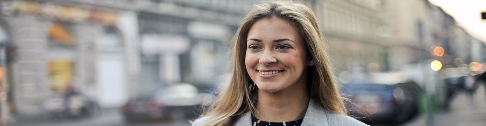 Businesswoman walking confidently outside