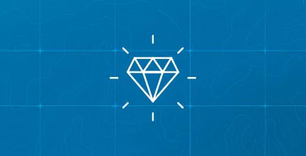 White diamond digital icon that is shining on a blue background.
