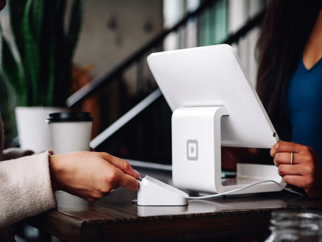 Person paying with a credit card