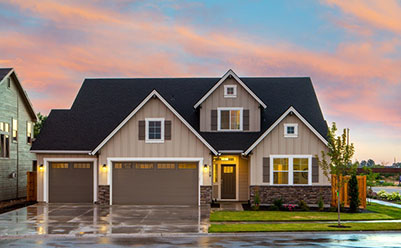 Brown and Gray Painted House in Front of Road Brown and Gray Painted House in Front of Road