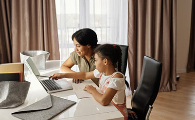 Mother and daughter at computer Mother and daughter at computer