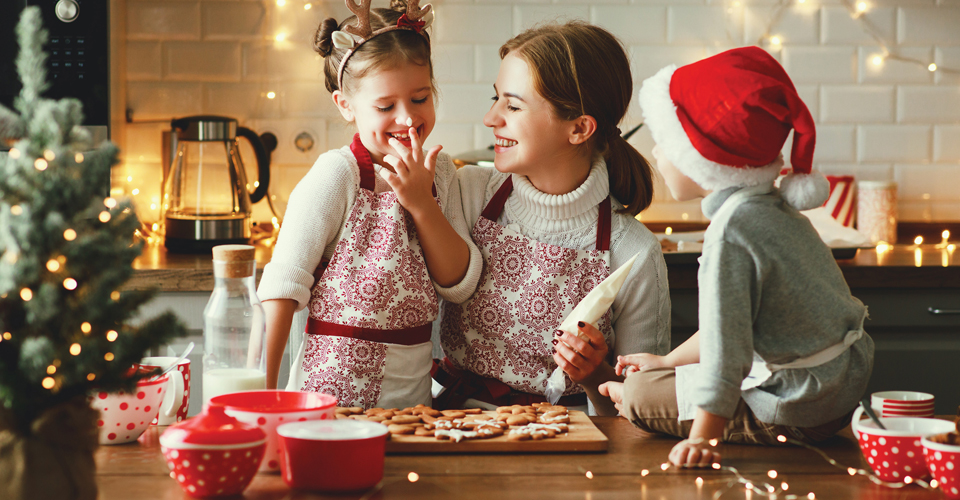 Happy family making Christmas cookies
