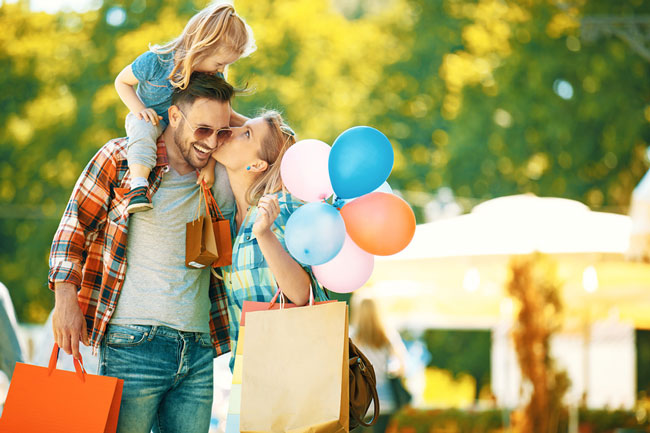 Earn points from your everyday purchases! Family at a outdoor event
