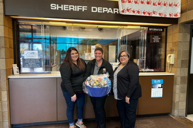 Wildfire Employees dropping off Gift Basket to First Responder