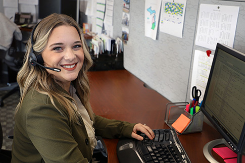 Smiling Wildfire Call Center Employee